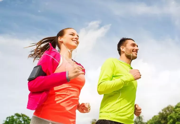 Men and women jog to be in good shape